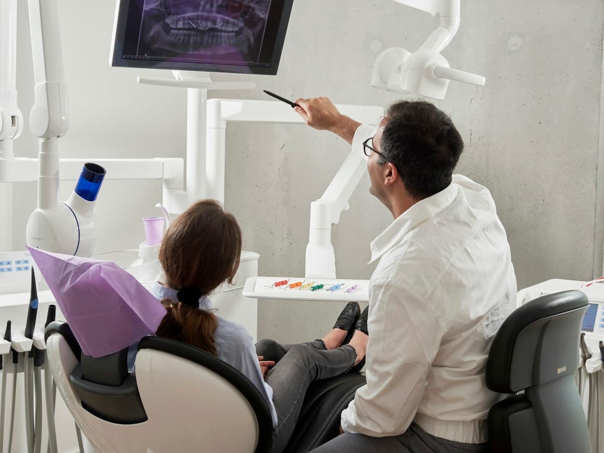Clinical dental implant consultation and precision assessment at ODENRO DENTAL CARE